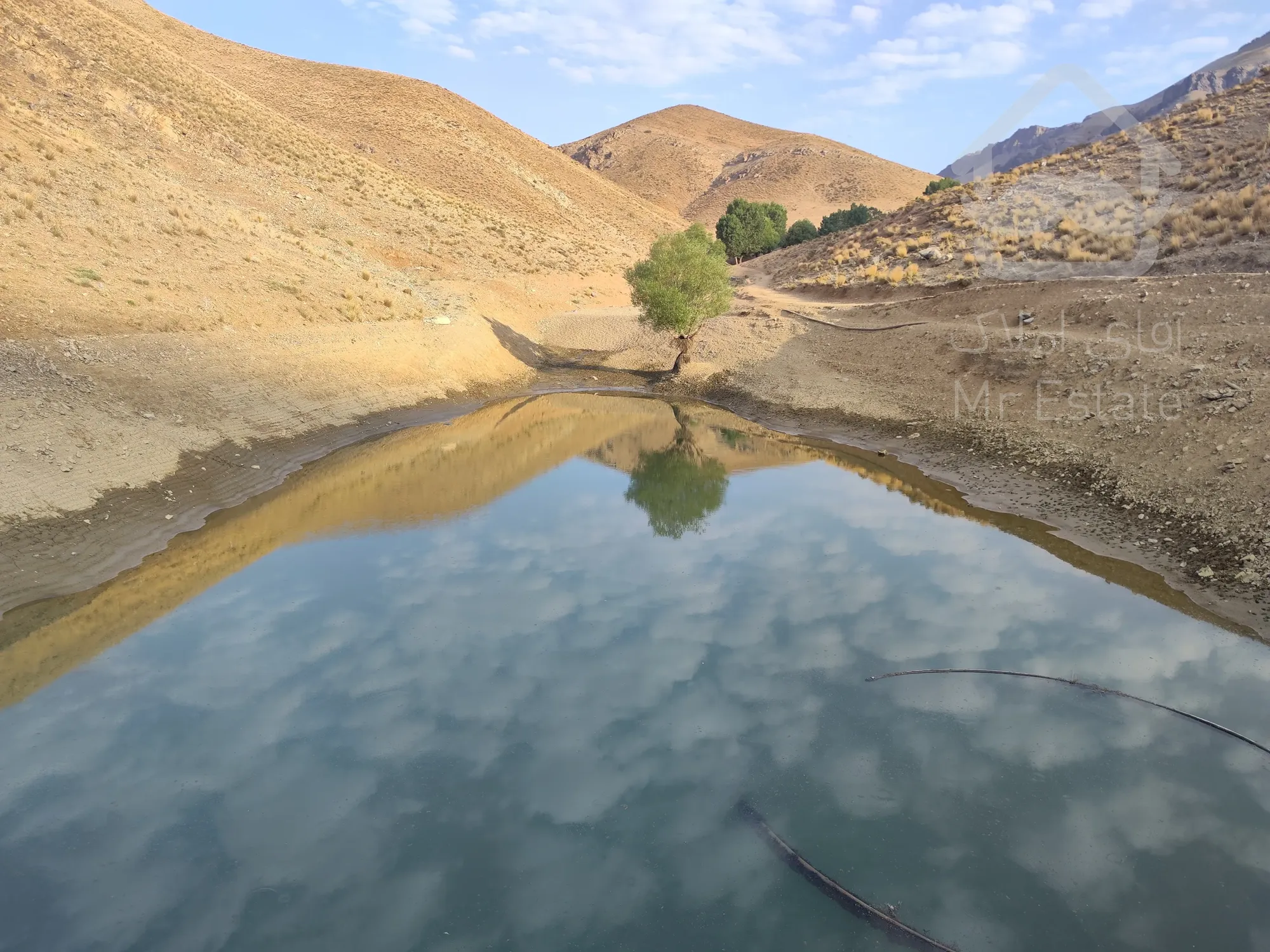تهاتر زمین مسکونی با موقعیت مناسب در شهر ابهر یا خرمدره با آپارتمان مسکونی در شهر تهران