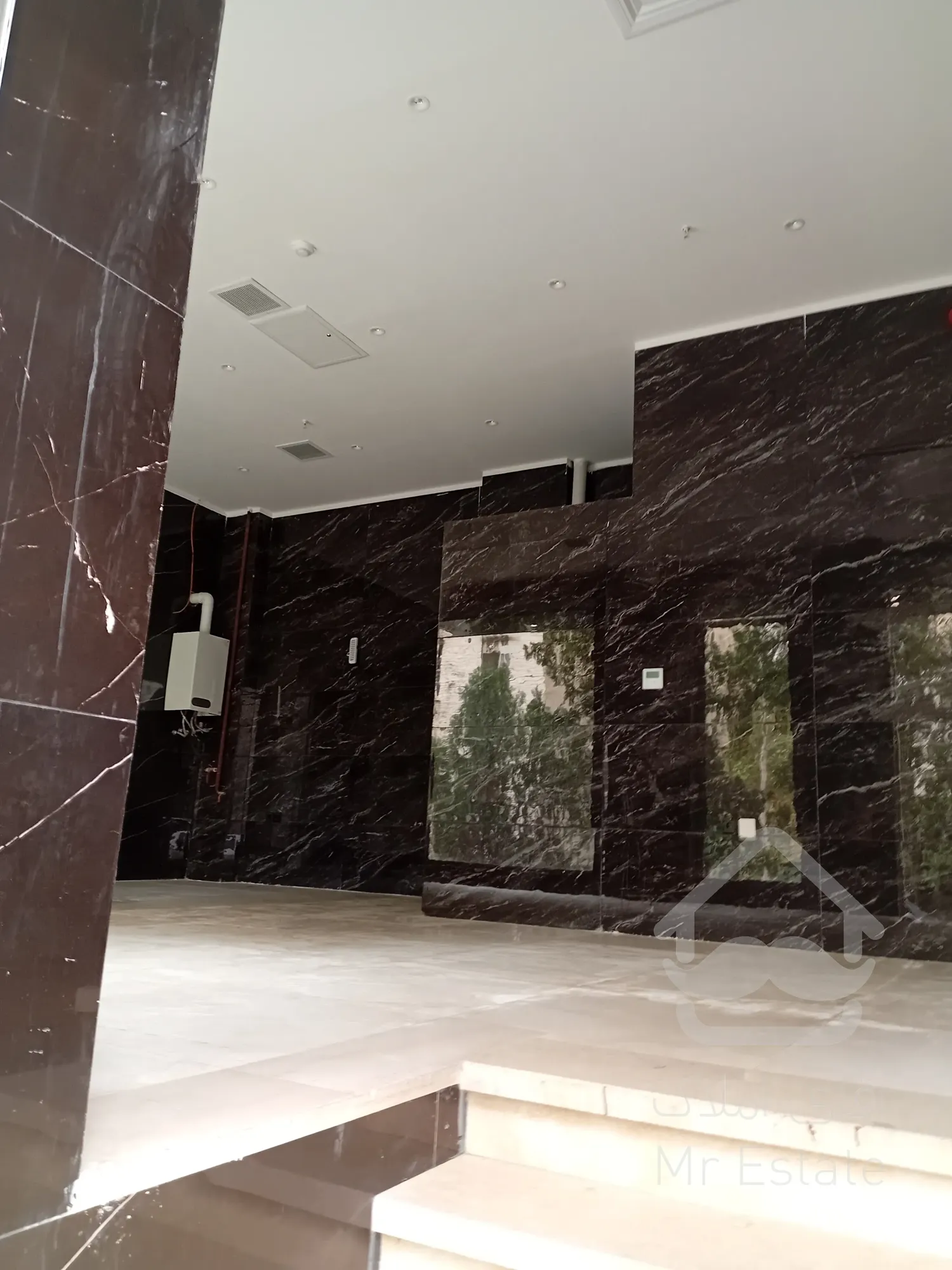 فروش به صورت یکجا 5 واحد مسکونی و 2 واحد تجاری در غرب تهران