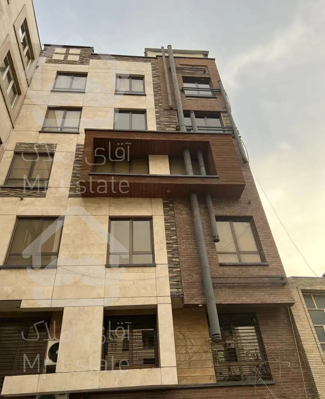 فروش یکجا ساختمان ادارى و تجارى بر اقدسیه