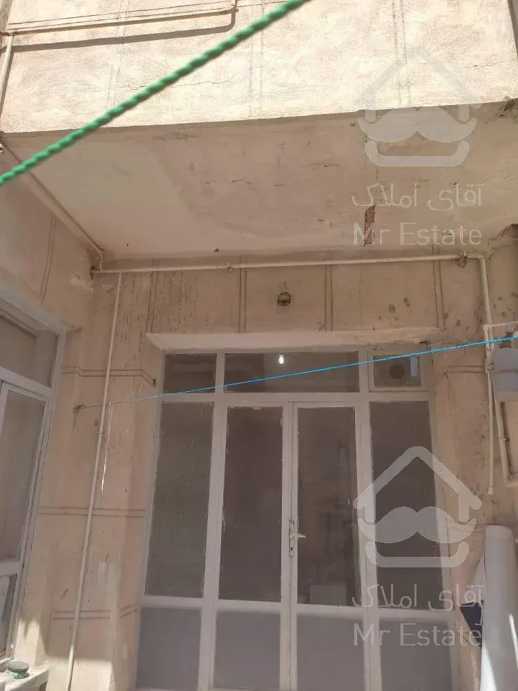 خانه ویلایی دو طبقه با مغازه 2 بر کوچه ۳۰ متری