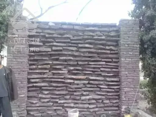 اجرای سنگ مالون سنگ ورقه ای سنگ نما رشیدی در تهران دماوند