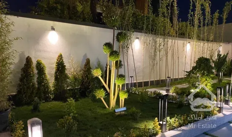 طراحی و اجرای فضای سبز چمن طبیعی و مصنوعی