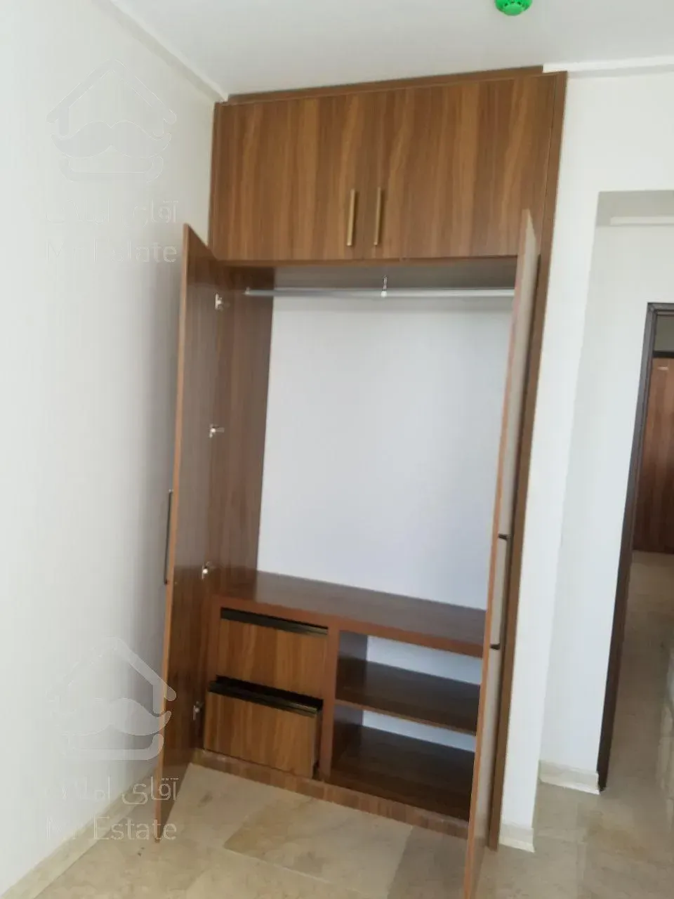 تهاتر 4 طبقه 75 متری نوساز با ملک کلنگی