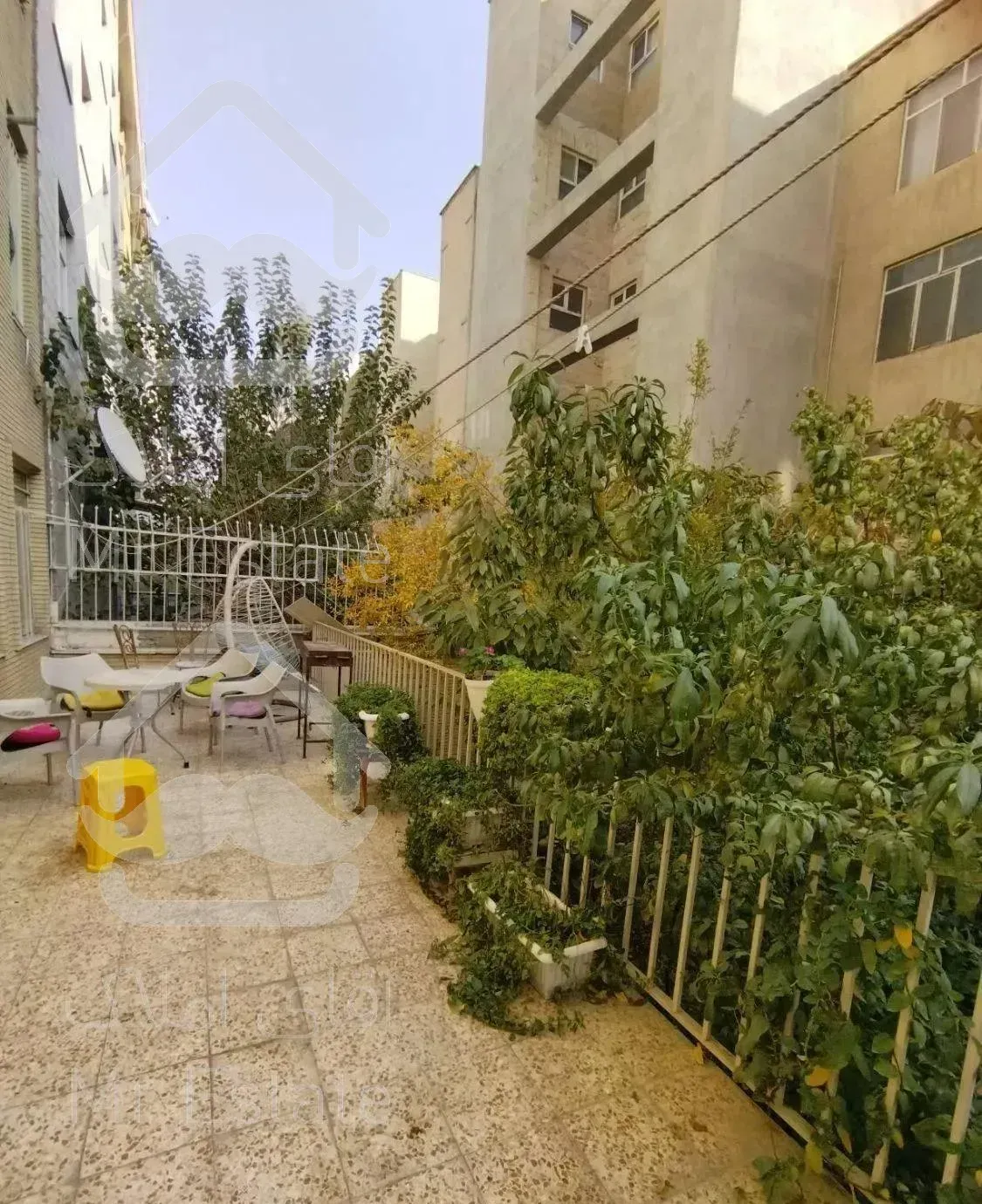 فروش آپارتمان ۱۰۰ متری با ۱۲۰ متر حیاط مستقل