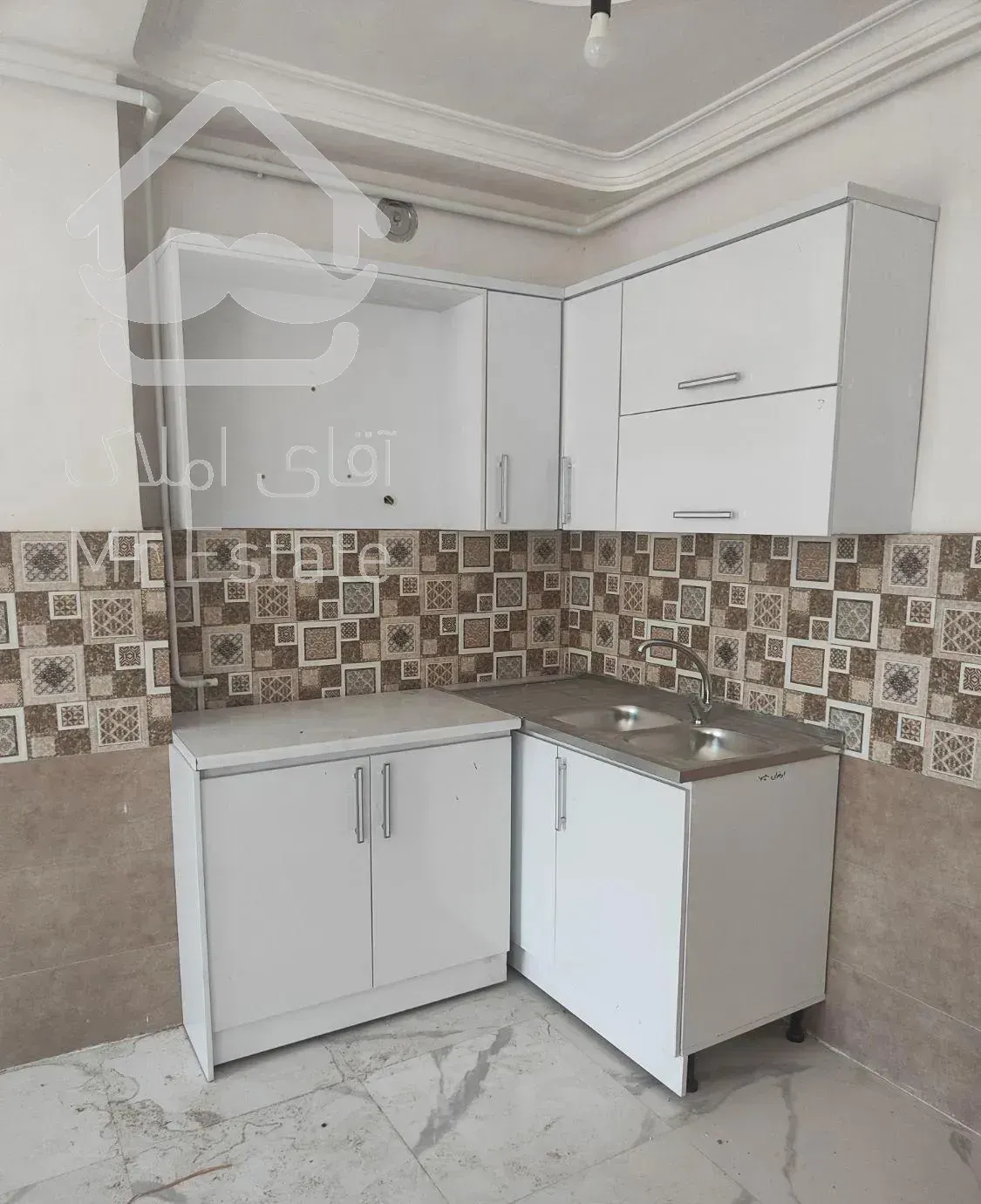 آپارتمان در بالا شهر سیاهکل،انصاری