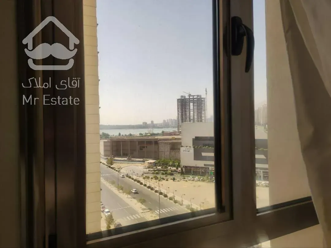 اجاره آپارتمان ۲ خواب خوش نقشه دیزاین شده غرق نور دارای چشم انداز ابدی برجهای ارکیده دریاچه چیتگر