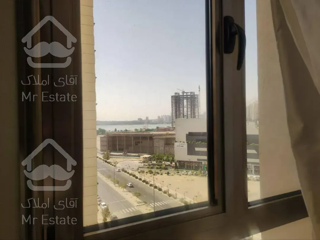 اجاره آپارتمان ۲ خواب خوش نقشه دیزاین شده غرق نور دارای چشم انداز ابدی برجهای ارکیده دریاچه چیتگر