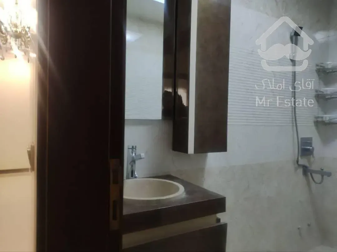 اجاره آپارتمان ۲ خواب خوش نقشه دیزاین شده غرق نور دارای چشم انداز ابدی برجهای ارکیده دریاچه چیتگر