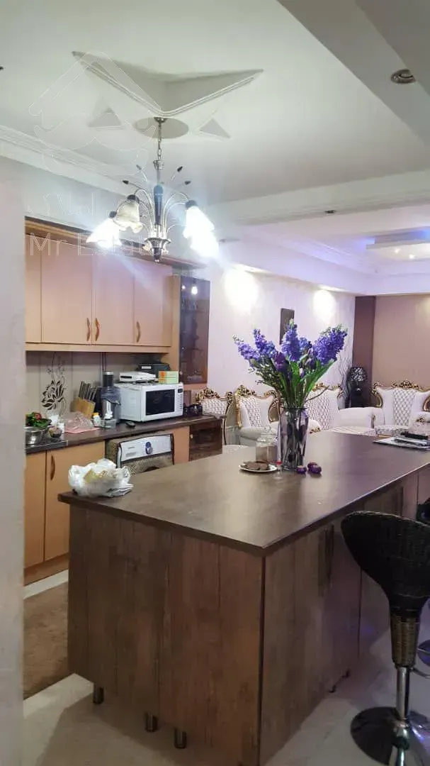 واحد ۱۲۷ متری جنت آباد مرکزی  نور پردازی عالی قیمتش موفته پارکینگ بالکن سالن بزگ  ۲ خواب بزگ عالی