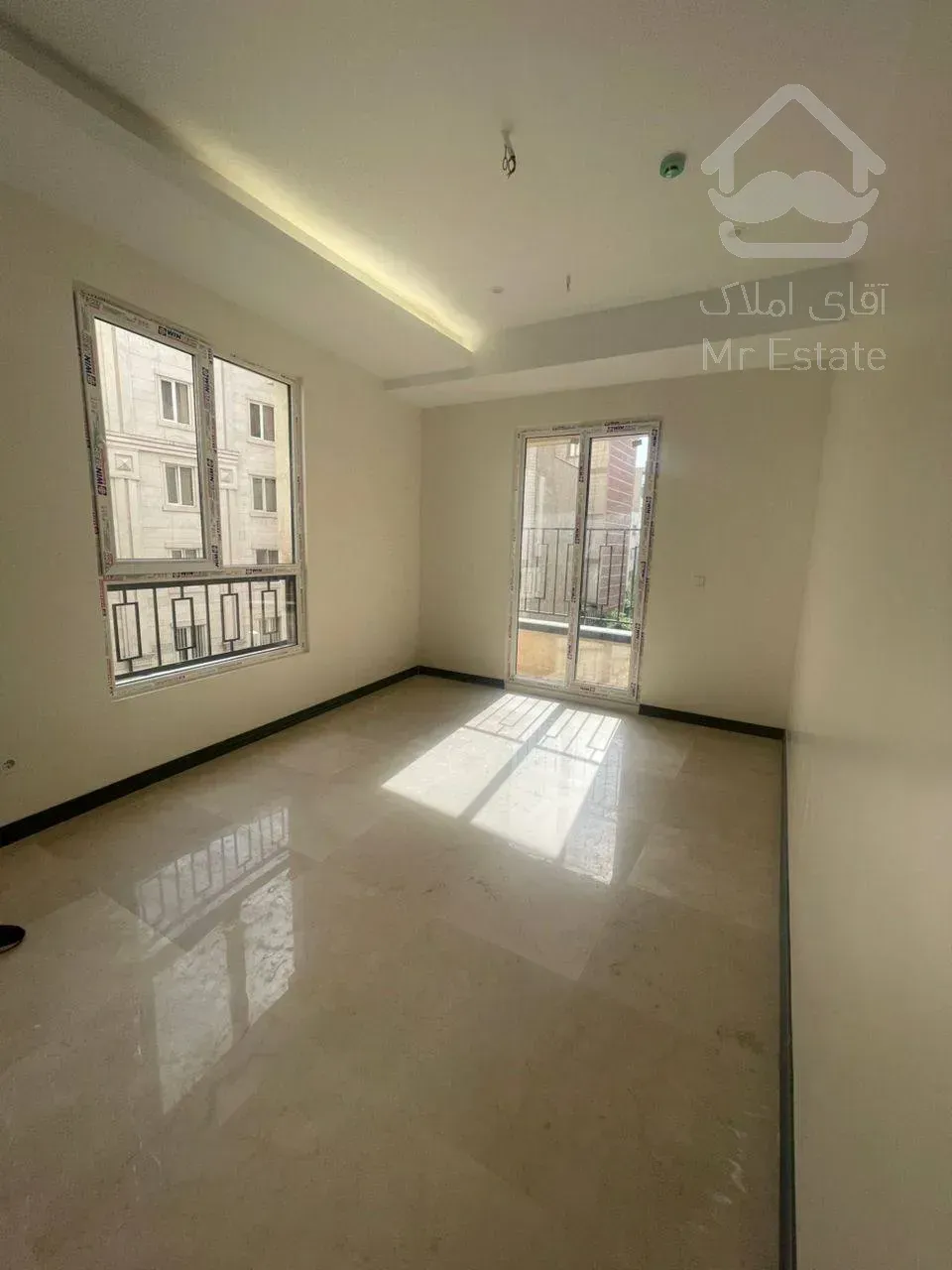 فروش آپارتمان ۹۹متری ۲خوابه نما تراورتن سالن پرده خور در شهرک نفت