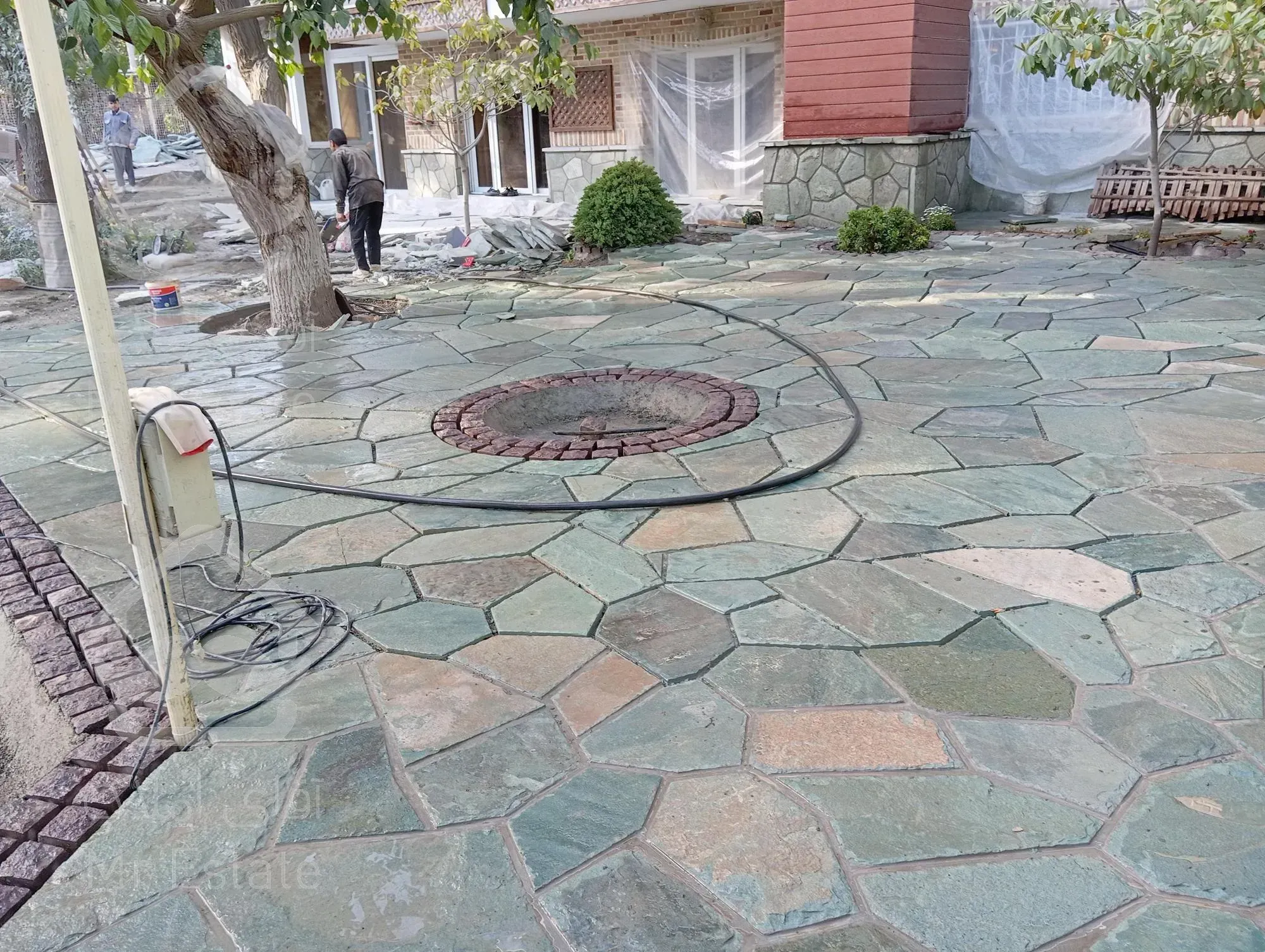 اجرای سنگ لاشه سنگ مالون سنگ ورقه ای رشیدی در تهران دماوند