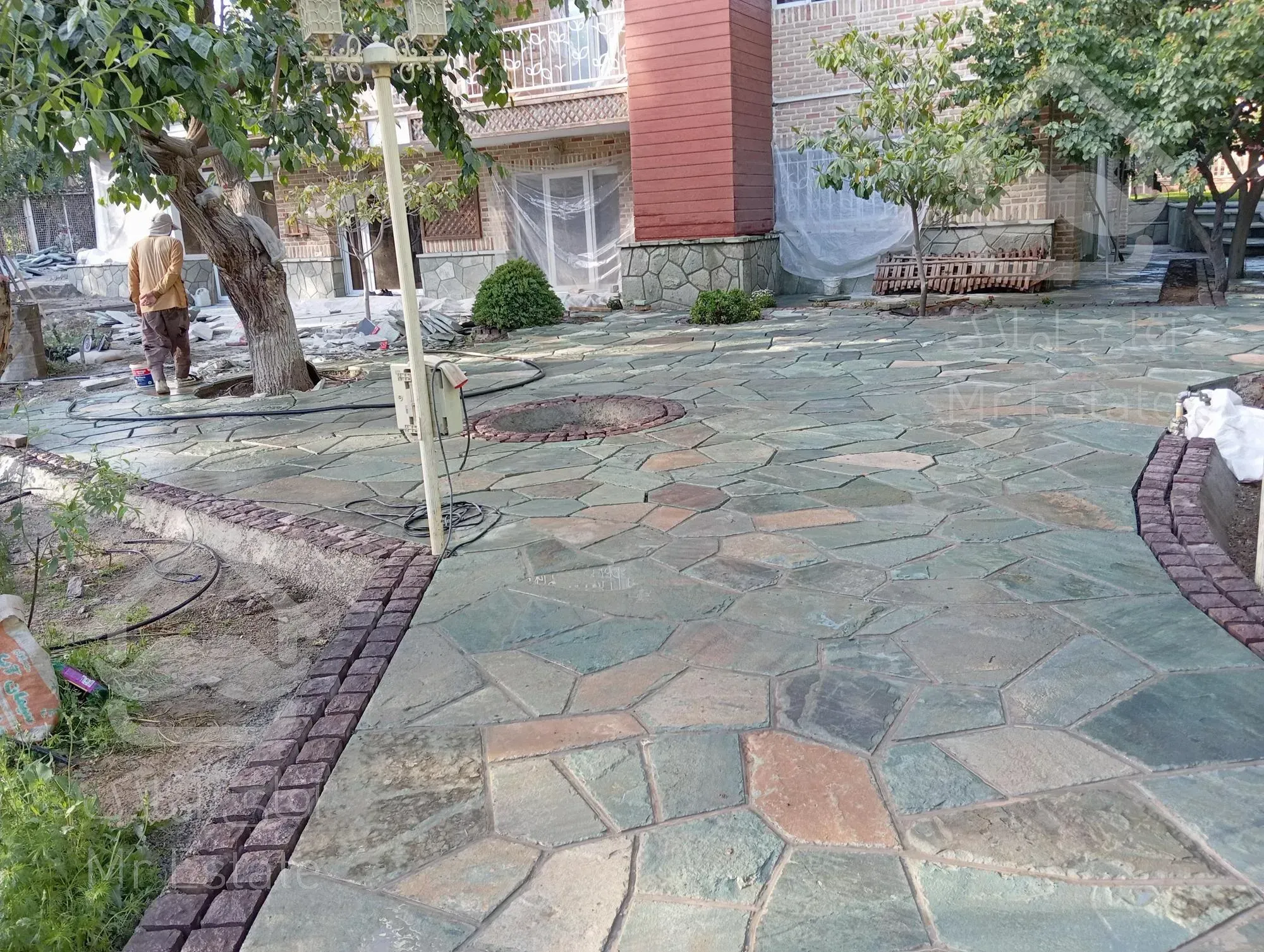 اجرای سنگ لاشه سنگ مالون سنگ ورقه ای رشیدی در تهران دماوند