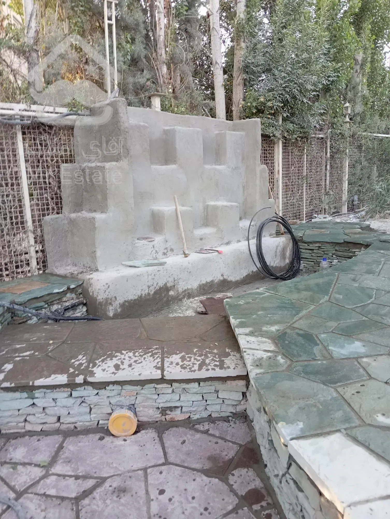 اجرای سنگ لاشه سنگ مالون سنگ ورقه ای سنگ نما رشیدی در تهران دماوند