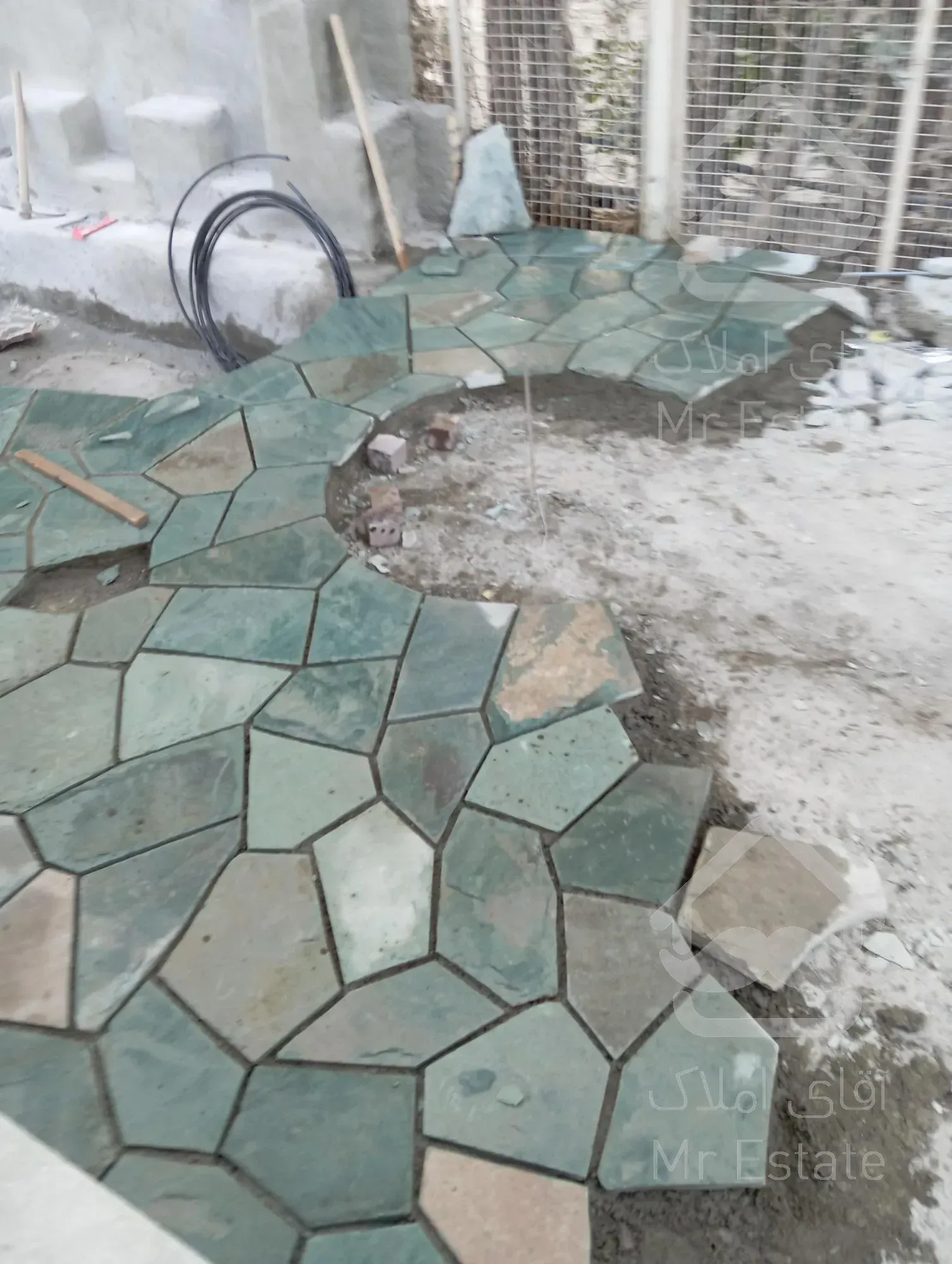 اجرای سنگ لاشه سنگ مالون سنگ ورقه ای سنگ نما رشیدی در تهران دماوند