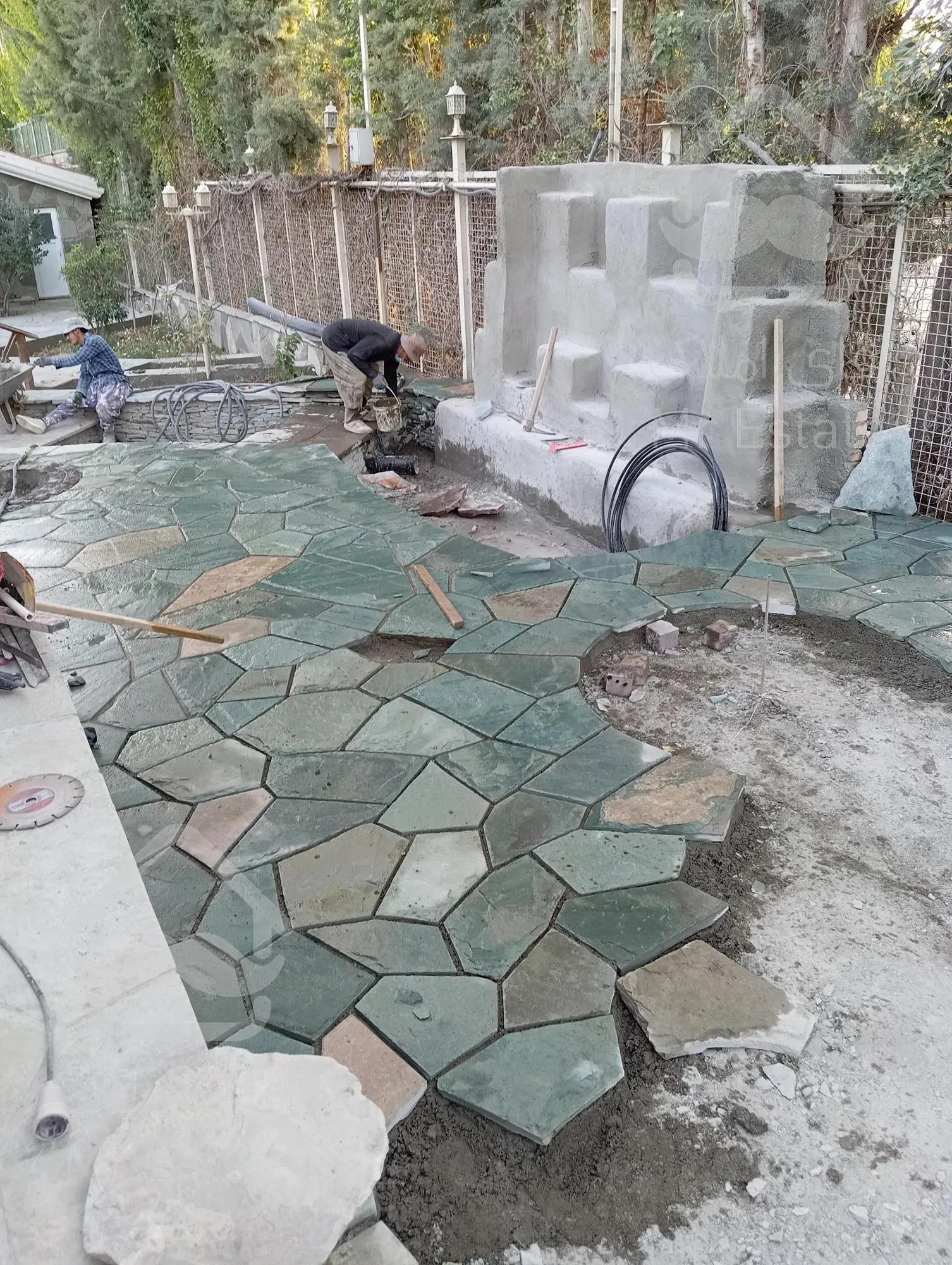 اجرای سنگ لاشه سنگ مالون سنگ ورقه ای سنگ نما رشیدی در تهران دماوند