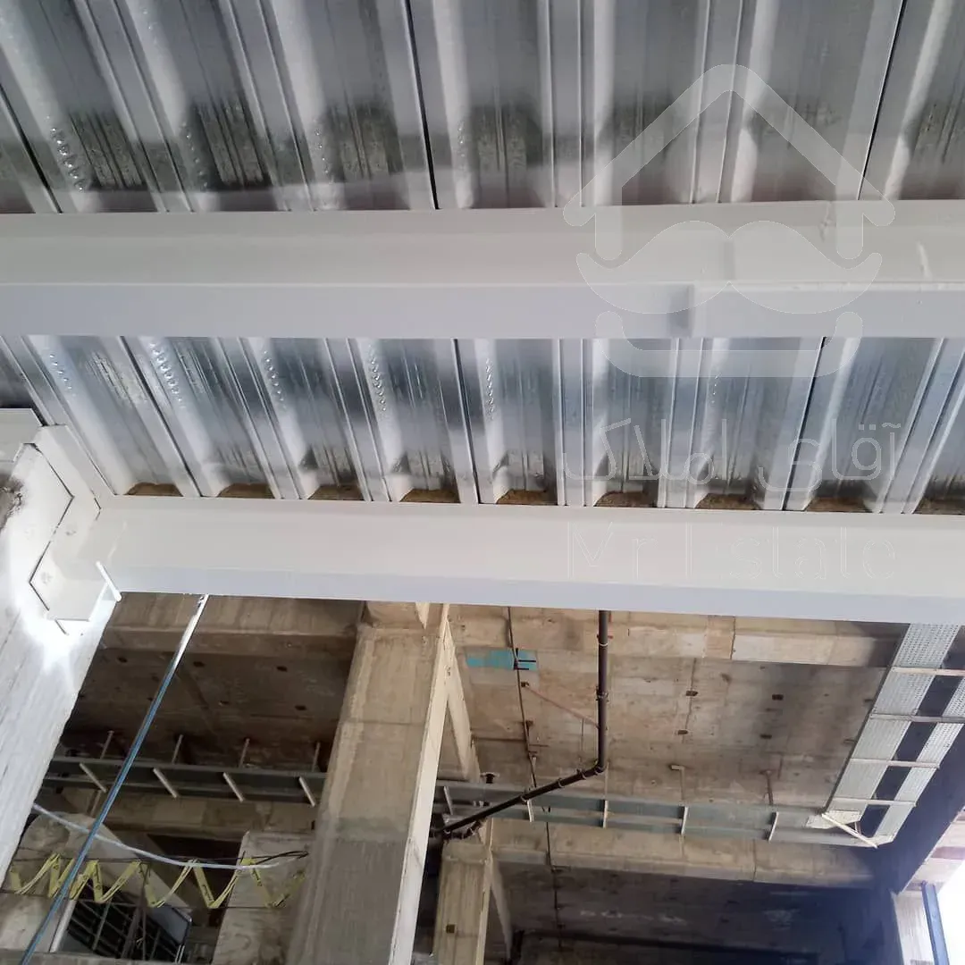 اجرای پوشش ضد حریق اسکلت فلزی شرکت بنیان عمران اکسون