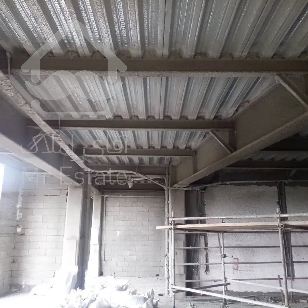 اجرای پوشش ضد حریق اسکلت فلزی شرکت بنیان عمران اکسون