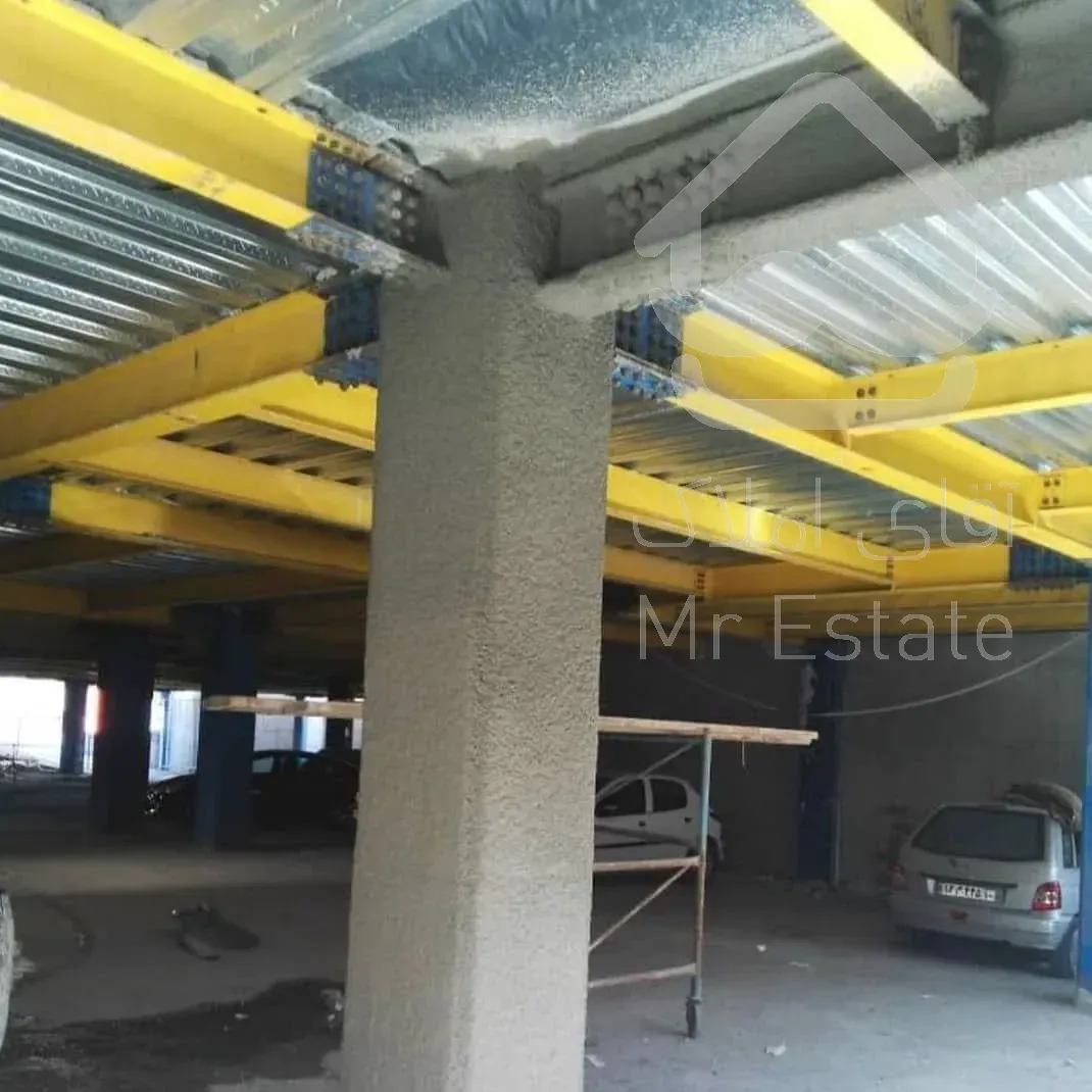 اجرای پوشش ضد حریق اسکلت فلزی شرکت بنیان عمران اکسون