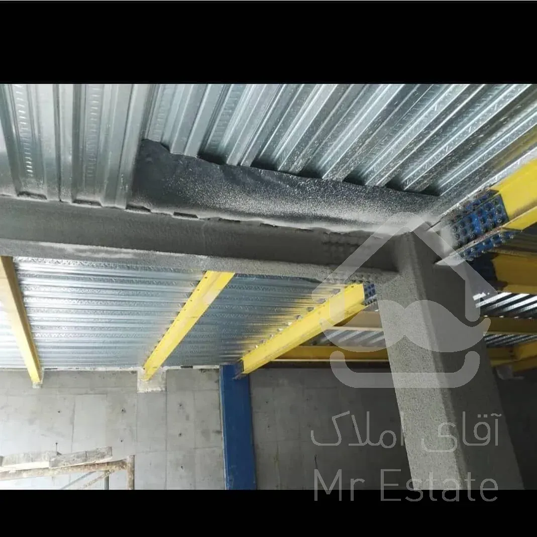 اجرای پوشش ضد حریق اسکلت فلزی شرکت بنیان عمران اکسون