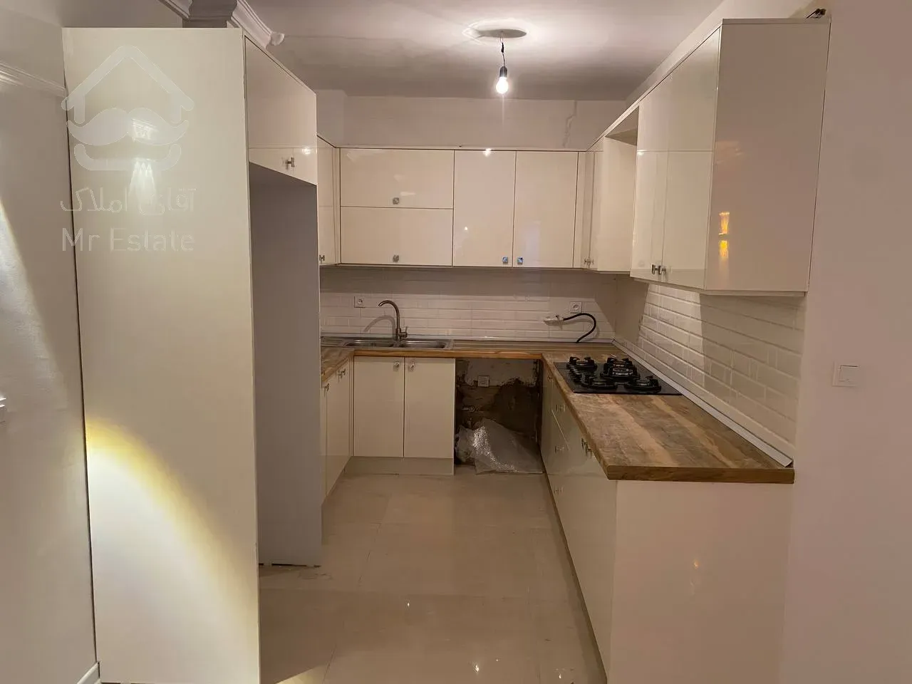 فروش آپارتمان ۶۳ متری یک خوابه نما تراورتن رو به بیرون در جنت آباد مرکزی