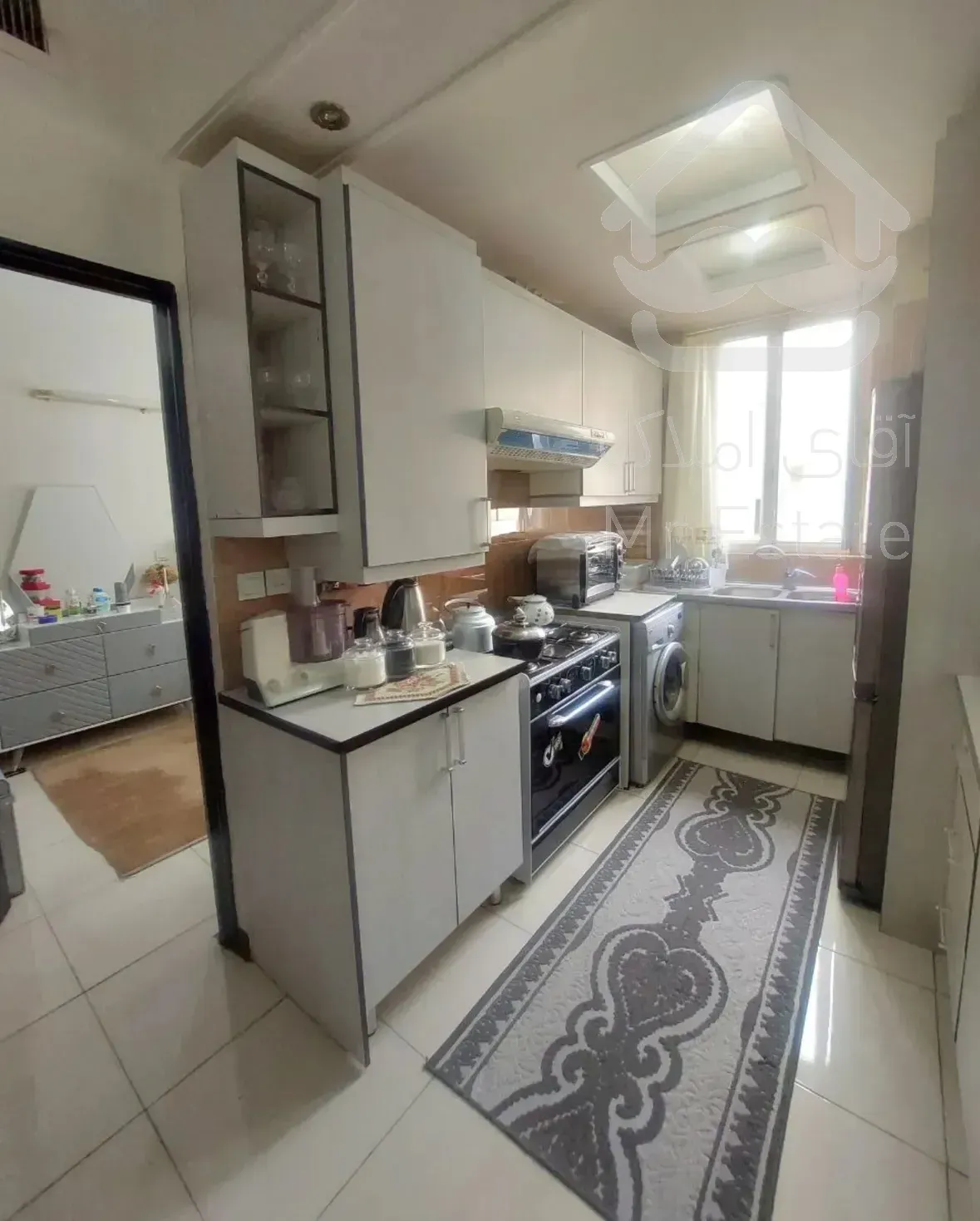 ۷۵ متر۲خوابه فول امکانات نما تراورتن سالن پرده خور در ورزی سمالی