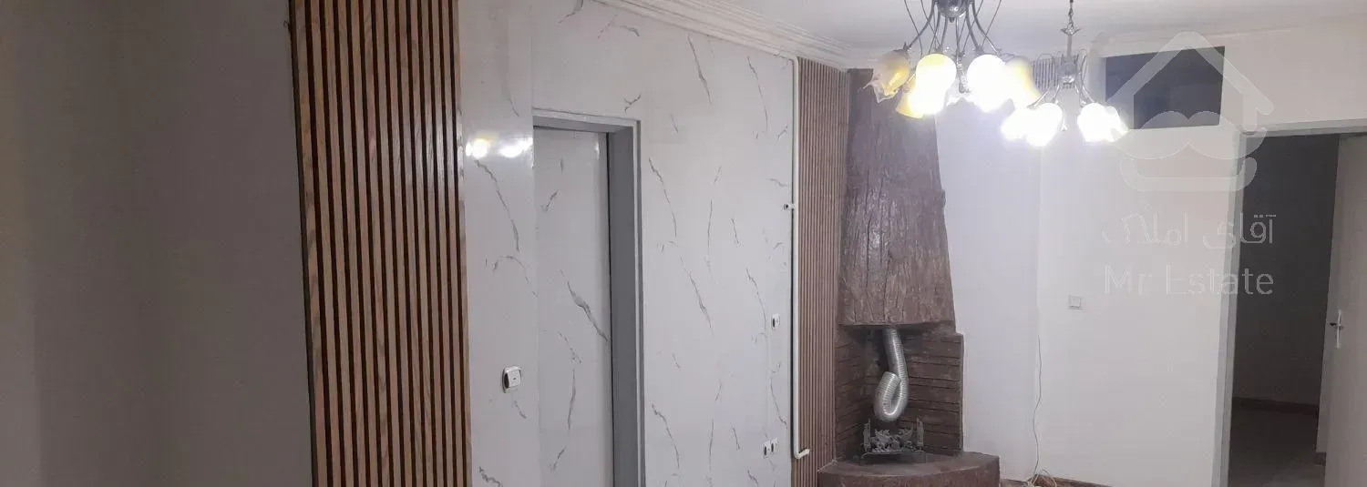 براصلی شهید بهشتی ساختمان دوکله نماگرانیت غرق نور