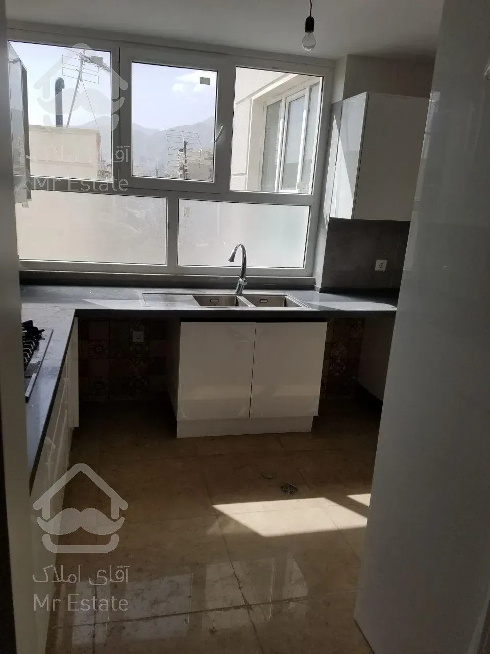 تهاتر 4 طبقه 75 متری نوساز با ملک کلنگی