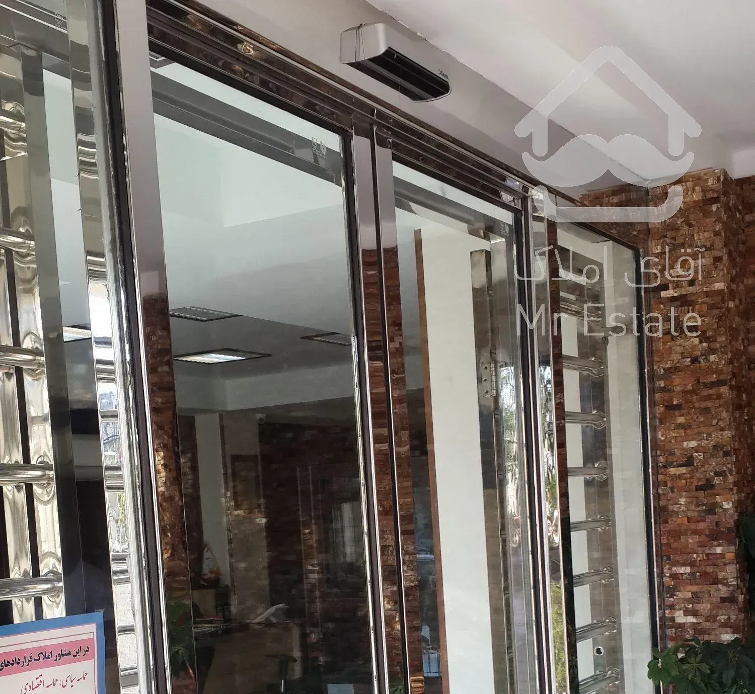 درب اتوماتیک شیشه ای اسلایدینگ با فریم استیل