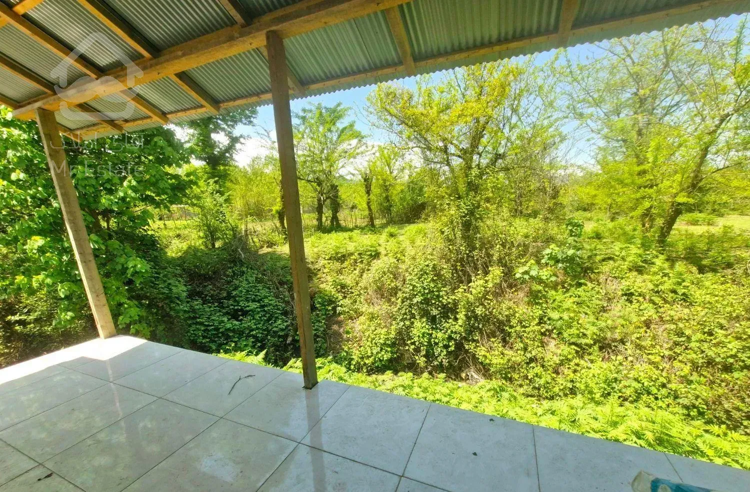 خانه ویلایی سرسبز ۲۰۰متر زمین ۷۰متر بنا نوساز