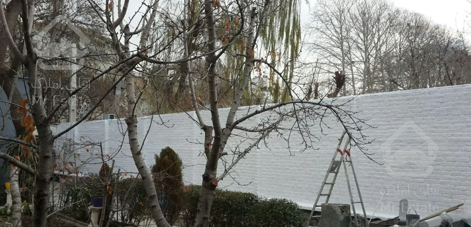 نقاشی ساختمان با دستگاه ایرلس و نما کار در ارتفاع