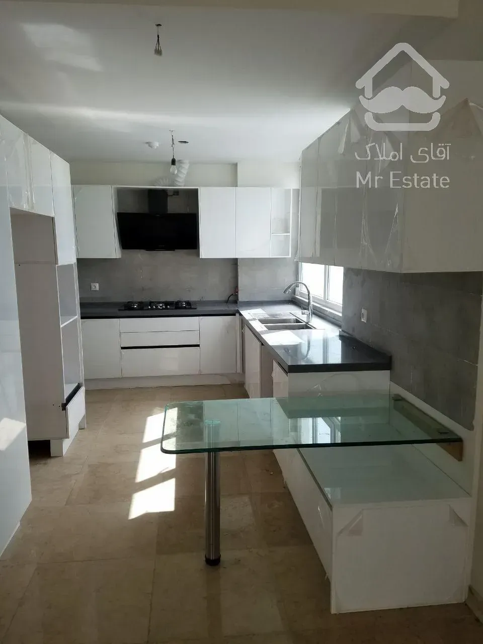 تهاتر 4 طبقه 75 متری نوساز با ملک کلنگی