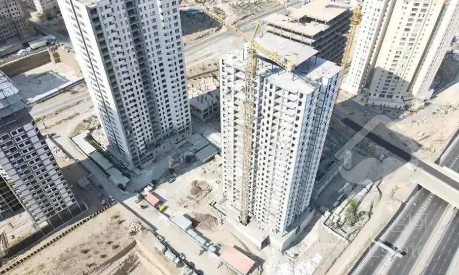 تهاتر برج در حال ساخت با ملک و زمین سند دار کرج