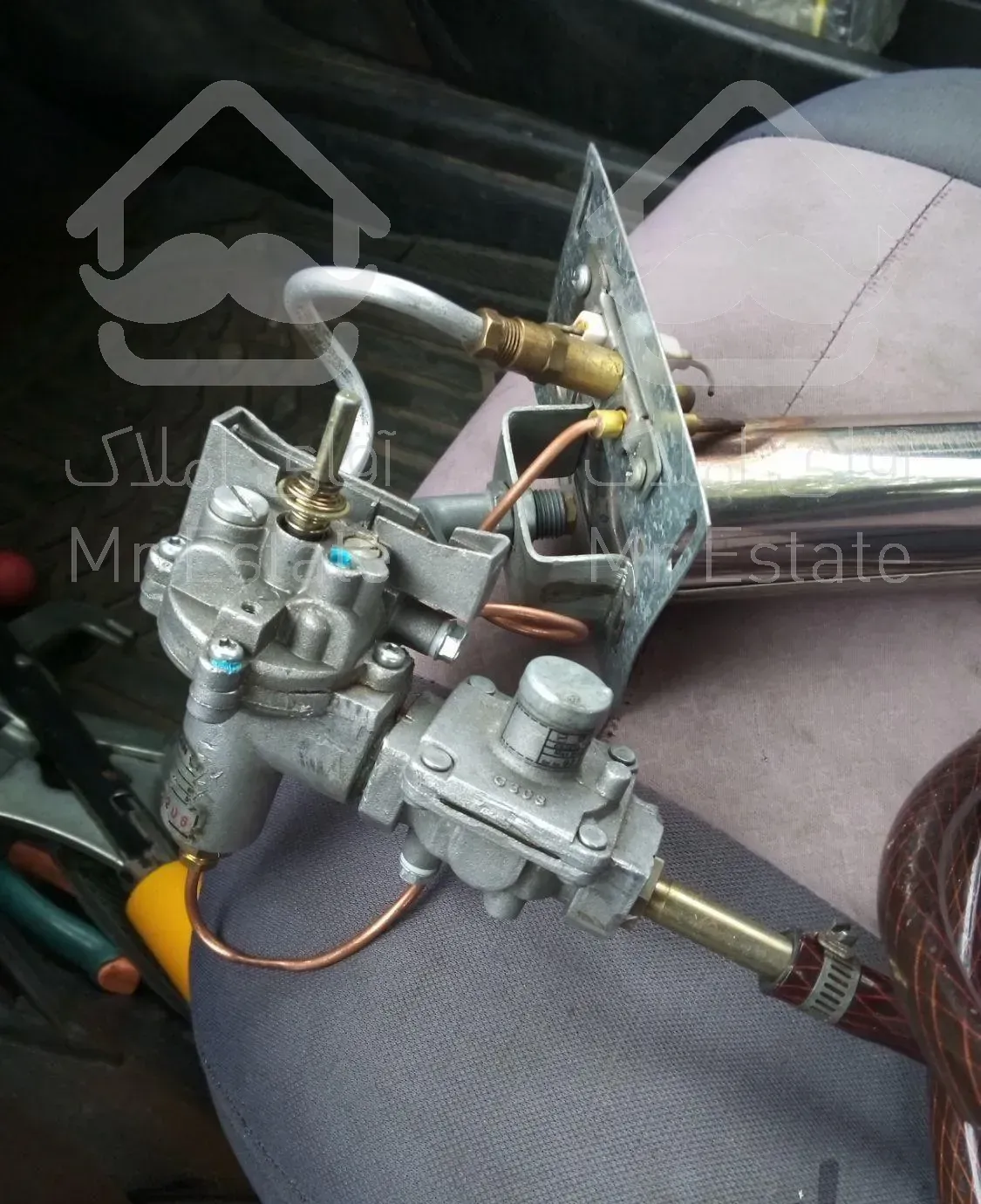 تعمیرات بخاری و هود اشپز خانه و لوستر. نصب شیرآلات