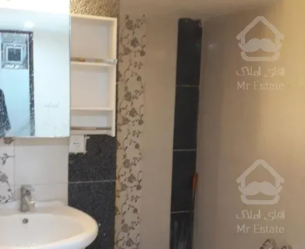 آپارتمان ۱۰۳متری همکف دوخوابه دارای حیاط اختصاصی