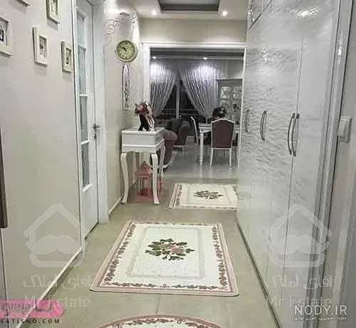 رهن و اجاره آپارتمان 100 متری دریاچه چیتگر سالن بزرگ و نورگیر برجهای ارکیده