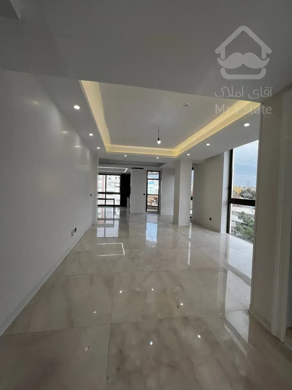 فروش اپارتمان اکازیون همراه با 2 واحد تجاری