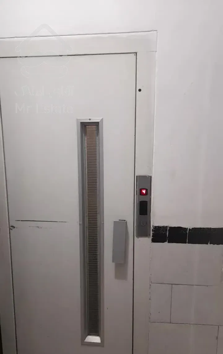 براصلی شهید بهشتی ساختمان دوکله نماگرانیت غرق نور