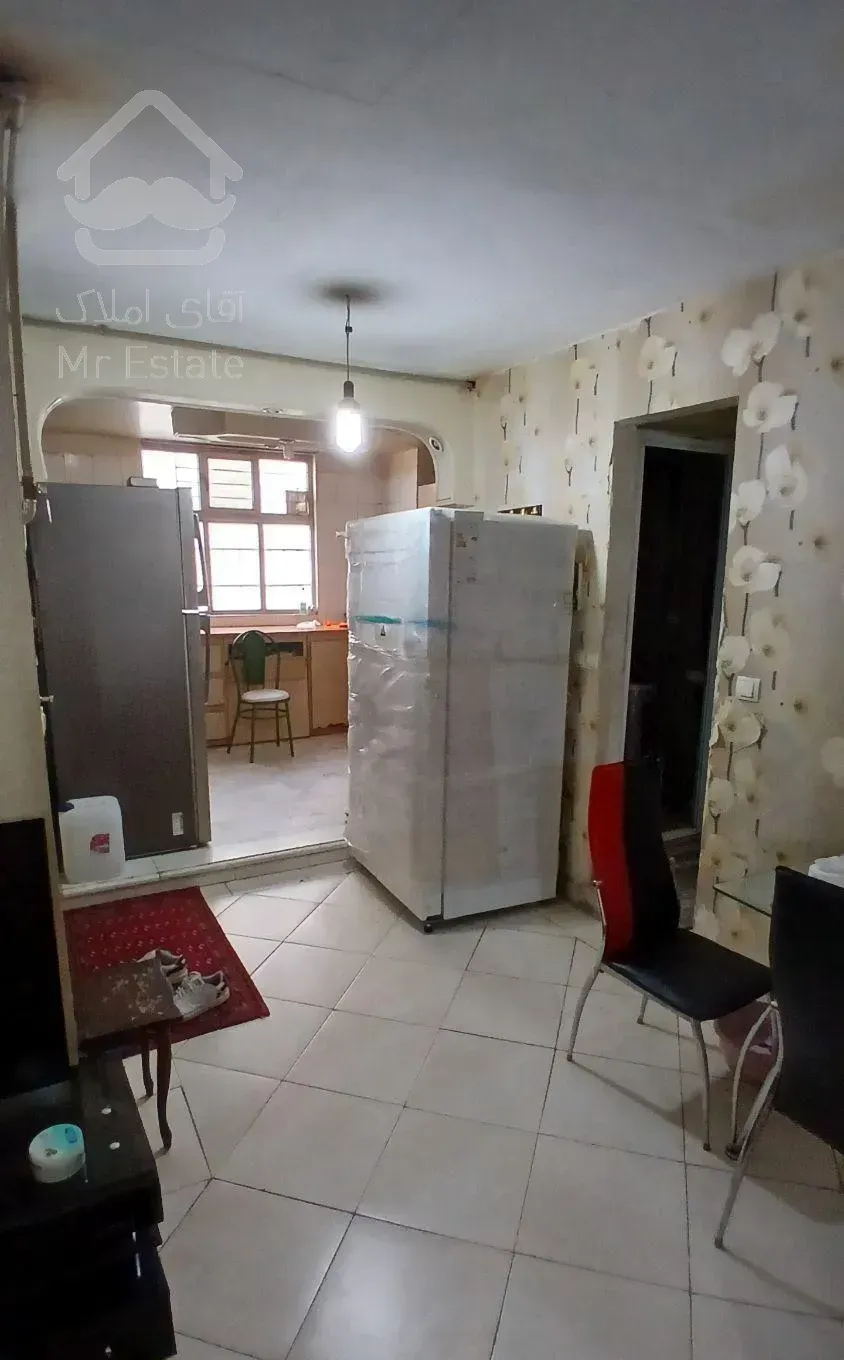 آپارتمان همکف با حیاط