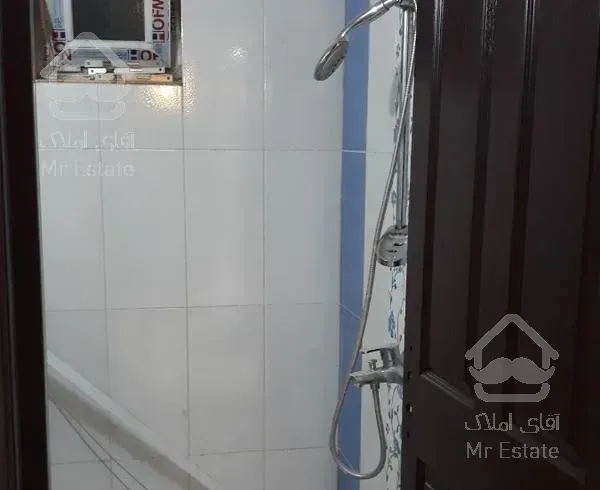 آپارتمان ۱۰۳متری همکف دوخوابه دارای حیاط اختصاصی