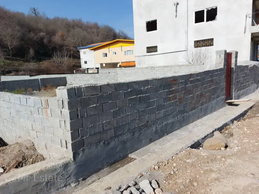 زمین مسکونی دردل جنگل رزکه آمل