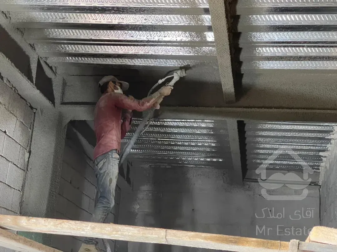 اجرای پوشش ضد حریق اسکلت فلزی شرکت بنیان عمران اکسون