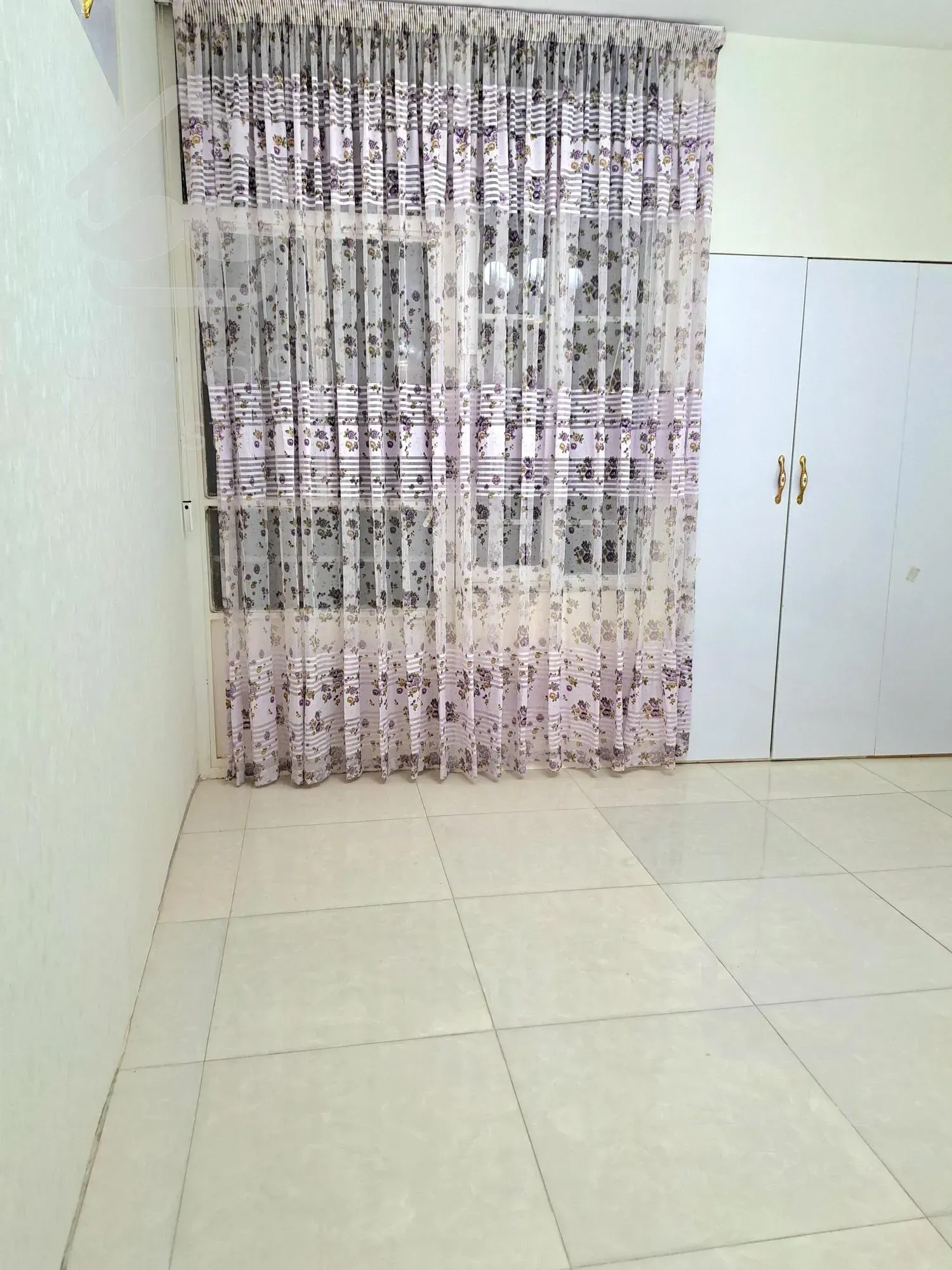 آپارتمان115 متری با 10متر حیاط اختصاصی دارای سقف کاذب(جمعا125 متر)در جانباز7