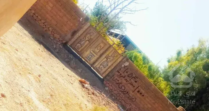 زمین 1000و 500 درب دیوار ورودی خاتونک