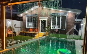 ویلا استخردار سمت زیباکنار/حیاط فضای دلنشین جنگلی