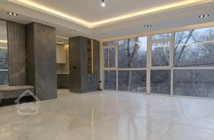 125متر آپارتمان/کلیدنخورده/۲پارکینگ/تاپ لوکیشن‌