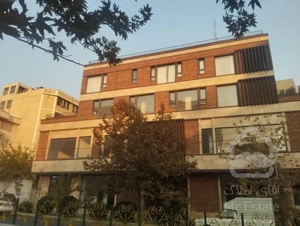 فروش ساختمان ۸۶۰ متر یکجا اداری تجاری نوساز میدان ونک