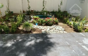 آپارتمان 85 متر با حیاط مشجر اختصاصی