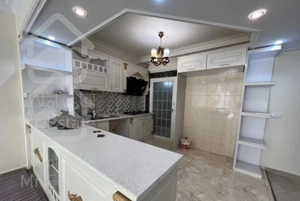 115 متر خوش چیدمان غرق نور و کم واحد