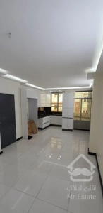 ۶۰ متر تراورتن* ساختمان کم سن*  دوکله نور