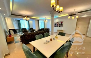 اپارتمان۸۲ متر/تراس باربیکیو/ارزنده تضمینی سود دهی